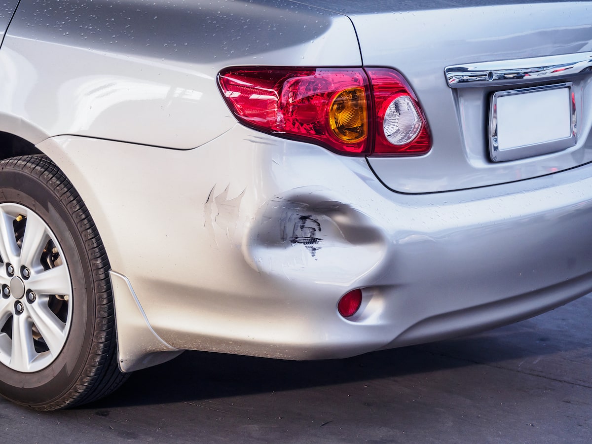 large car dent in need of professional dent removal