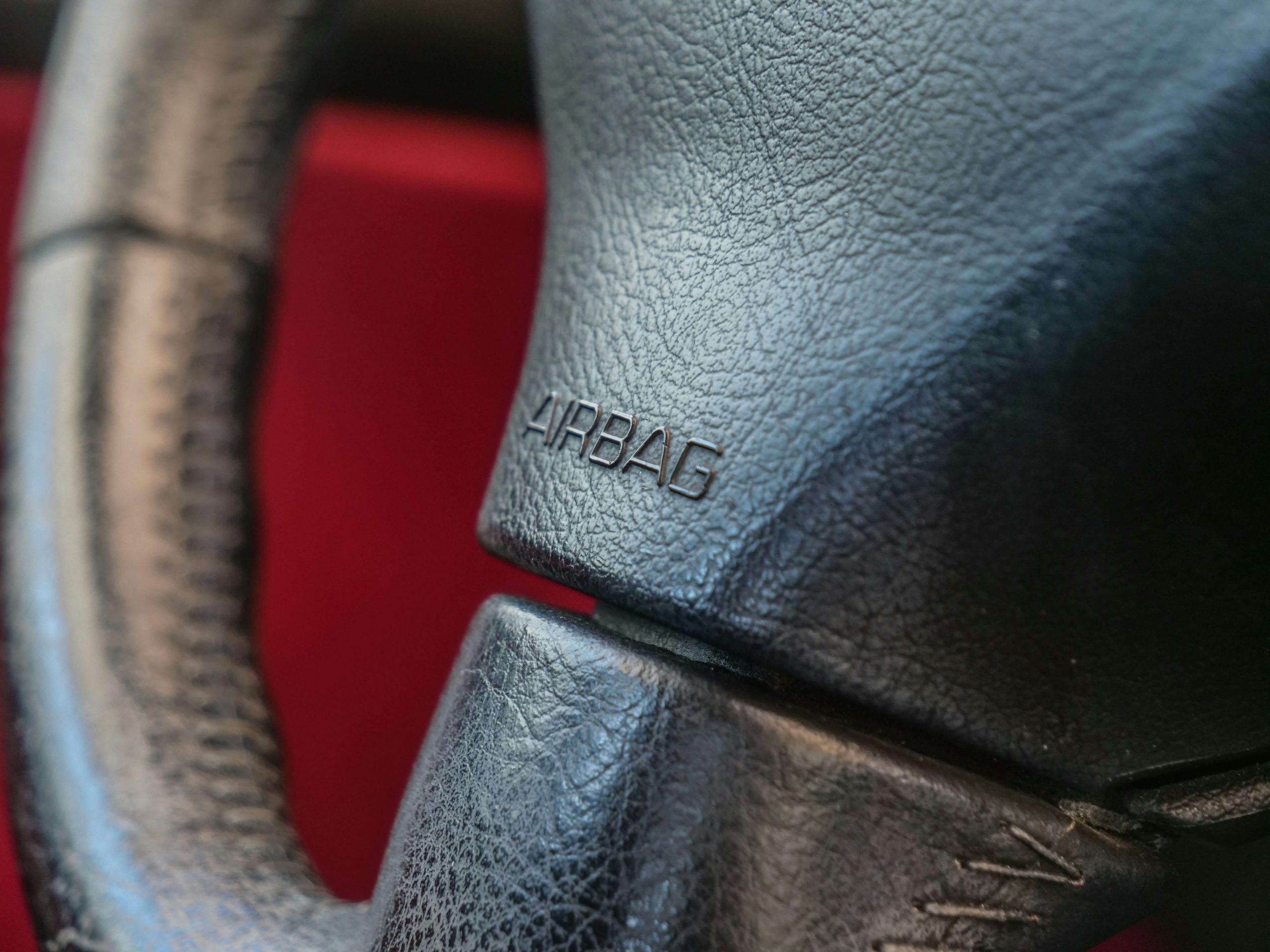 closeup of airbag label on steering wheel