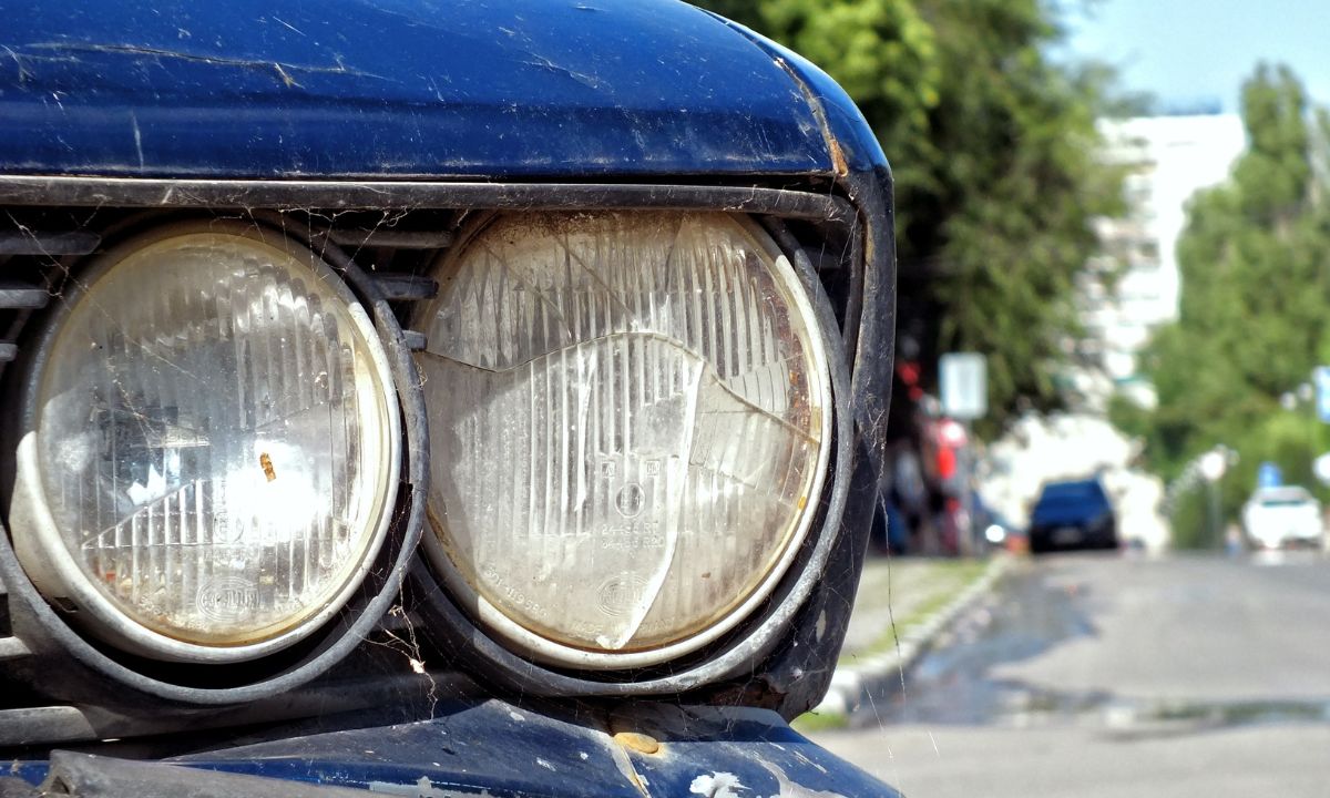 Mackins - car with headlight damage