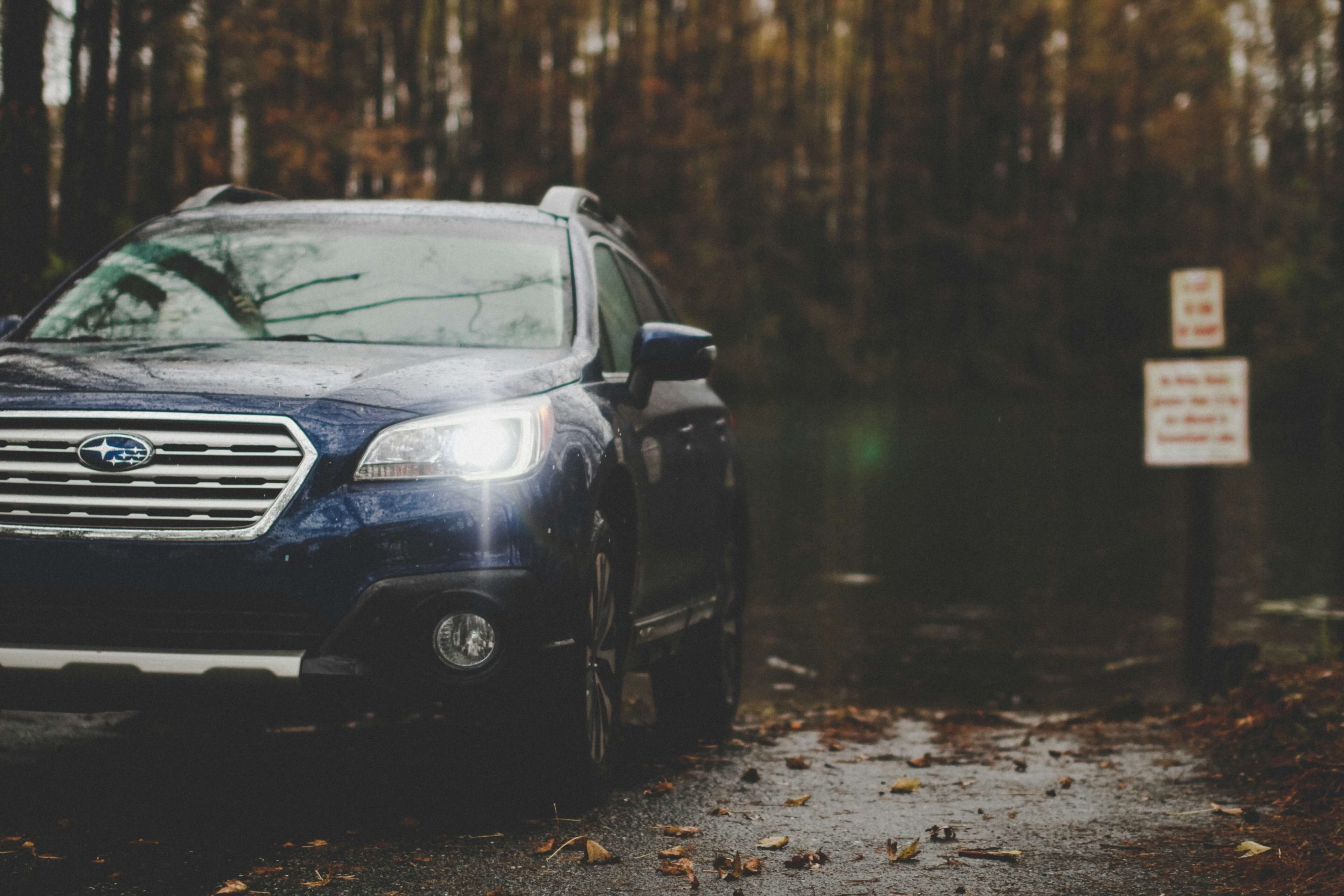 Subaru in woods