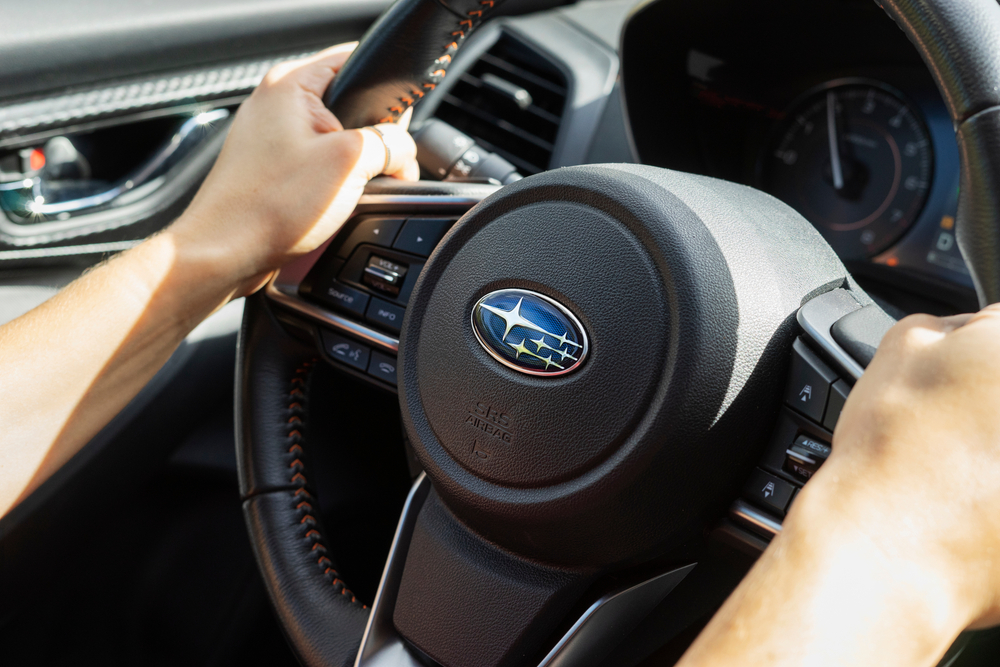 Vancouver,,Bc,/,Canada,-,September,27,,2020:,Woman,With subaru steering wheel