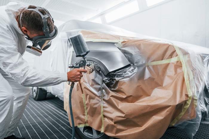 professional painting a car
