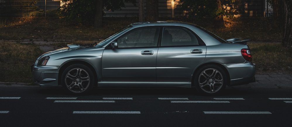 gray subaru on the road